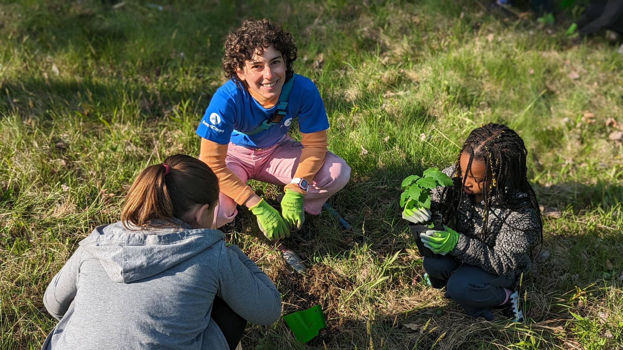 Helping HB students plant a tree – Julie Olivo